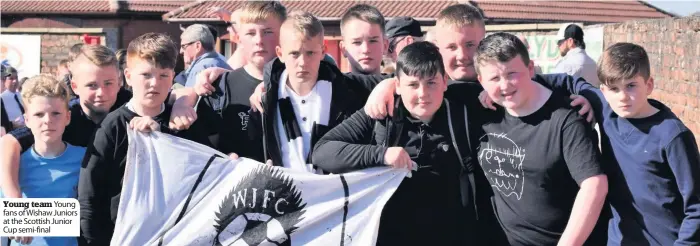  ??  ?? Young team Young fans of Wishaw Juniors at the Scottish Junior Cup semi-final