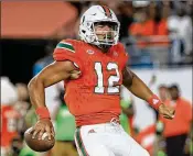  ?? MIKE EHRMANN / GETTY IMAGES ?? Hurricanes quarterbac­k Malik Rosier has thrown seven intercepti­ons this season, but for the most part has taken care of the ball.