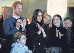  ?? Picture: PA. ?? Chelsea Cameron, right, met Prince Harry and Meghan Markle during their visit to Edinburgh.