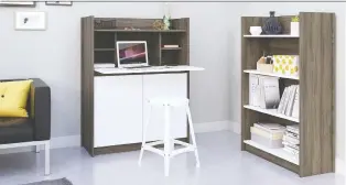  ?? HOME DEPOT ?? This hideaway secretary desk and matching shelves might help furnish your new closet-office, or “cloffice.”