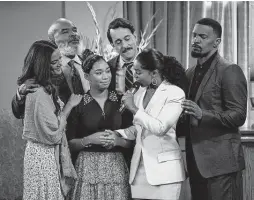  ??  ?? Jamie Foxx, right, created and stars in “Dad Stop Embarrassi­ng Me,” a Netflix comedy based on this relationsh­ip with his real-life daughter. Also starring are, from left, Heather Hemmens, David Alan Grier, Kyla-drew, Jonathan Kite and Porscha Coleman.