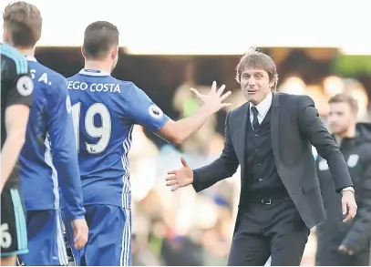 ?? — Gambar Reuters ?? GANDINGAN MANTAP: Conte (kanan) meraikan kemenangan bersama Costa selepas tamat perlawanan Liga Perdana Inggeris menentang West Bromwich Albion di Stamford Bridge, London dalam gambar fail bertarikh 11 Disember 2016.