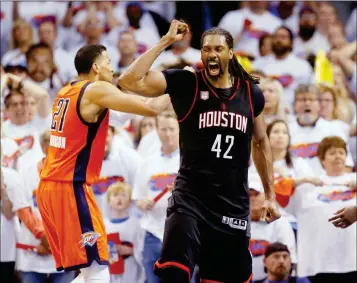  ?? ASSOCIATED PRESS ?? HOUSTON ROCKETS’ NENE (42) CELEBRATES in front of Oklahoma City Thunder forward Andre Roberson (21) in the fourth quarter of Game 4 of a first-round NBA basketball playoff series in Oklahoma City on Sunday. Houston won 113-109.