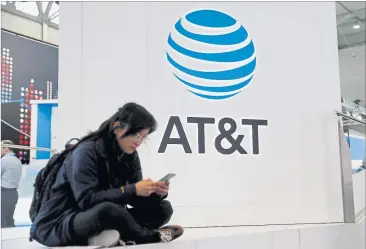  ?? [ Reuters ] ?? Künftig sollen sich Kunden des USMobilfun­kers AT&T viel öfter ein Video aus dem Hause Time Warner anschauen.