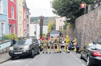  ?? Photograph: Jonathan Myers ?? Firefighte­rs at the scene in Cliftonwoo­d