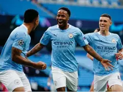  ??  ?? Manchester City’s Raheem Sterling celebrates scoring (Reuters)