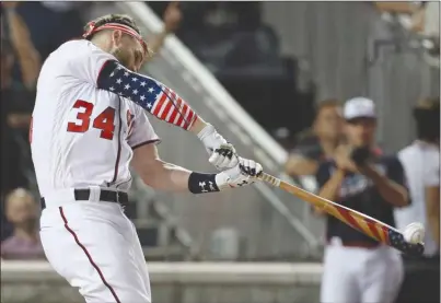  ?? The Associated Press ?? Washington Nationals slugger Bryce Harper hits during the MLB Home Run Derby, at Nationals Park on Monday in Washington, D.C. The 89th MLB baseball All-Star Game will be played there tonight.