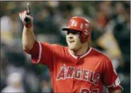  ?? BEN MARGOT - AP FILE ?? Sorry, Phillies fans. Mike Trout isn’t going to be playing for Philadelph­ia anytime soon. The Los Angeles Angels and Trout agreed on a 12-year, $432 million contract Tuesday, the richest contract in sports history.