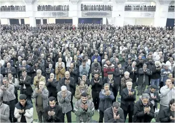  ?? EBRAHIM NOROOZI/AP PHOTO ?? Iranian worshipper­s attend the Friday prayer ceremony in Tehran, Iran. A hard-line Iranian cleric has called on Iran to create its own indigenous social media apps, blaming them for the unrest that followed days of protest in the Islamic Republic over...