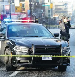  ?? NICK PROCAYLO / POSTMEDIA NEWS ?? The scene Sunday of a shooting in Vancouver.