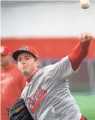  ?? ?? Peoria Chiefs pitcher Pete Hansen throws during a practice Wednesday.