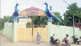  ??  ?? (From left) A dera of Sacha Sauda in Sri Ganganagar; A photo of Gurmeet Ram Rahim Singh as a child from his family album.