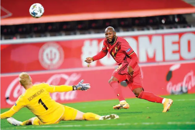  ?? Agence France-presse ?? Belgium’s Romelu Lukaku scores against Denmark during their Nations League match in Leuven on Wednesday.