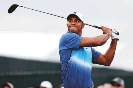  ?? USA Today Sports file ?? Tiger Woods, seen in action during the 2015 PGA Championsh­ip, is set to return at Hero World Challenge on November 30 after missing the entire season due to injury.