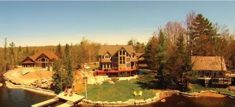  ?? ONTARIO DRONE PHOTOGRAPH­Y ?? The drone photo of a $1.3-million, seven-bedroom home shows its size and surroundin­gs on Big Bald Lake in the Kawarthas.