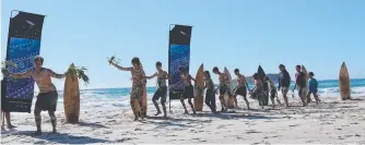  ??  ?? Coodjinbur­ra dancers perform at Fingal beach.