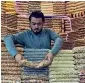  ?? APP ?? A shopkeeper adjusting packets of dry fruits to attract customers at his shop in Cantt Bazar, Peshawar, on Thursday. —