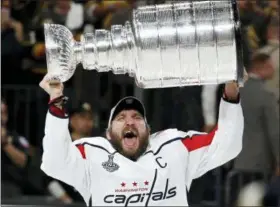  ?? JOHN LOCHER — THE ASSOCIATED PRESS FILE ?? The past 10 years, Capitals star Alex Ovechkin went into the offseason facing questions about not being able to win and criticism of not being able to get it done. He is now a playoff MVP and Stanley Cup winner and his epic Stanley Cup celebratio­n will...