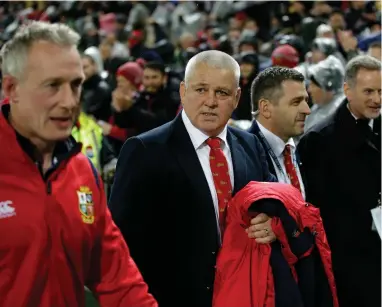  ??  ?? FIGHTING TALK: British and Irish Lions head coach Warren Gatland walks from the field after the second rugby test between the Lions and the All Blacks.