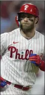  ?? (AP file photo) ?? Philadelph­ia’s Bryce Harper is set to report to Clearwater, Fla., to start his spring training Wednesday. Harper has been recovering from reconstruc­tive surgery on his right elbow.