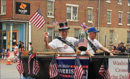  ?? DFM FILE PHOTO ?? In this file photo, Norristown Ambassador Hank Cisco waves to crowds along West Marshall Street in the 2016 Norristown 4th of July parade.