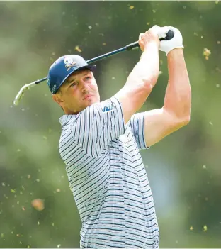  ?? ANDREW REDINGTON/GETTY ?? Bryson Dechambeau plays his shot from the fourth tee during the first round of the Masters tournament at Augusta National Golf Club on Thursday in Augusta, Ga.