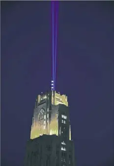  ?? University of Pittsburgh ?? The University of Pittsburgh's blue victory lights, which shine straight up from the Cathedral of Learning after sports victories, could confuse migrating birds, disrupting migration and leading to bird deaths.