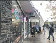  ?? RACHEL RAVINA - MEDIANEWS GROUP ?? Patrons wait outside of Lochel’s Bakery, located at 57 S. York Road in Hatboro, Friday morning as the shop complies with COVID-19 health and safety protocols.