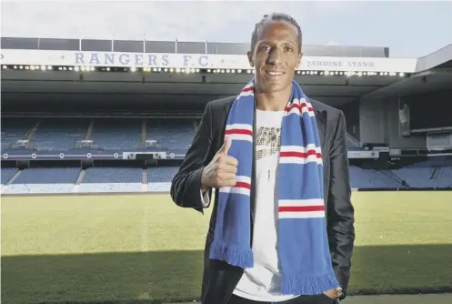  ??  ?? Bruno Alves at Ibrox yesterday after he completed his move to Rangers from Serie A side Cagliari on a two-year contract.