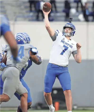  ?? JOE RONDONE/THE COMMERCIAL APPEAL ?? Memphis Tigers quarterbac­k Grant Gunnell throws the ball during their Friday Night Stripes spring game at the Liberty Bowl Memorial Stadium.