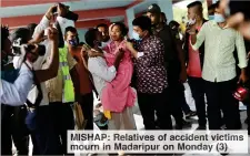  ??  ?? MISHAP: Relatives of accident victims mourn in Madaripur on Monday (3)