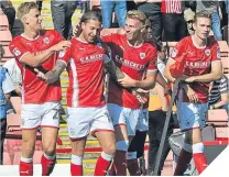  ??  ?? ■ George Moncur celebrates his goal.