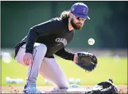  ?? AARON ONTIVEROZ — THE DENVER POST ?? The Rockies’ Brendan Rodgers works a short hop drill at second base during Spring Training at Salt River Fields in Scottsdale, Ariz., on Feb. 21.