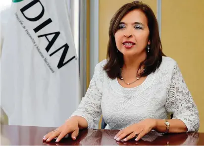  ?? FOTO ?? La directora de Ingresos de la Dian, Cecilia Rico, recordó que el descuento de 80% sobre intereses y sanciones solo se aplica a obligacion­es de 2012 y años anteriores.