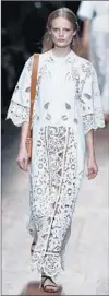  ?? Ian Langsdon European Pressphoto Agency ?? A BOHO LACE paneled maxi dress from Valentino.