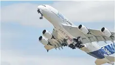  ??  ?? An Airbus A380, the world’s largest jetliner, takes part in flying display, during the 52nd Paris Air Show at Le Bourget Airport near Paris, France. Dubai wants a guarantee that Airbus will keep production of the A380 superjumbo open for at least 10...