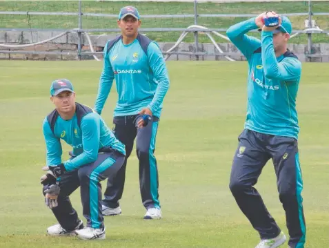  ?? Picture: AAP ?? ON NOTICE: David Warner, Usman Khawaja and Steve Smith in a fielding drill in Port Elizabeth.