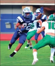  ?? FRANK CROWE / For the Calhoun Times ?? Gordon Central’s Gauge Giddens (22) makes a cut on a run against Murray County.