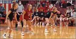  ?? MEDIANEWS GROUP ?? Sacred Heart libero Bella O’Toole, center, waits for a serve with teammates Macie Moresco, left, and Emily McKenna, right, against Canton. O’Toole leads the Lions into the PIAA Class A final against defending champion Clarion Area on Saturday.