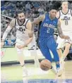  ?? PHELAN M. EBENHACK/AP ?? Elfrid Payton (2) and the Magic were embarrasse­d Saturday by Ricky Rubio and the Jazz.