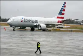  ?? L.M. OTERO — THE ASSOCIATED PRESS FILE ?? An American Airlines Boeing 737 Max jet plane is parked at a maintenanc­e facility in Tulsa, Okla., earlier this month. The plane flew again Tuesday for the first time since safety regulators grounded it after two deadly crashes.