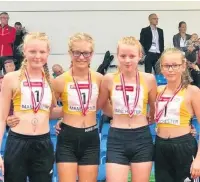  ??  ?? ●●Holly Stewart, Millie Everett, Emma Wood Doyle and Lola Unsworth, second in 4 x 100m