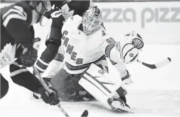  ?? FRANK GUNN AP ?? Emergency goalie David Ayres saw action for Carolina vs. Toronto. Ayres drives the Zamboni at Leafs games.