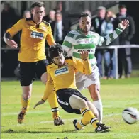  ??  ?? Fort’s Farquhar MacRae (left) and David Moffat snuff out Buckie’sJames Fraser