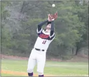  ?? STAFF PHOTO BY AJ MASON ?? McDonough third baseman Trevor Drummond catches a pop fly to end top of the second inning in Thursday’s SMAC Potomac Division baseball game versus visiting North Point. North Point won the game 4-3.