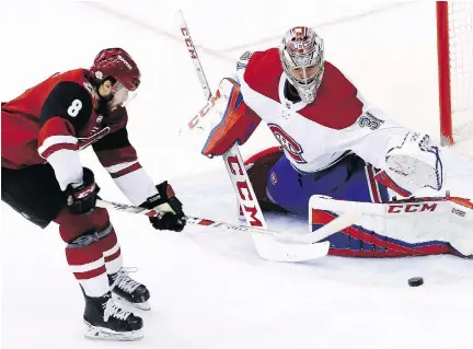  ?? ROSS D. FRANKLIN/THE ASSOCIATED PRESS ?? Canadiens goaltender Carey Price makes a save on Coyotes winger Tobias Rieder Thursday in Glendale, Ariz. Rieder and the Coyotes had the last laugh, however, as the German forward scored in the Coyotes’ 5-2 rout of the Habs.