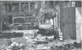  ??  ?? Une rue en ruine dans la vieille ville de Mossoul