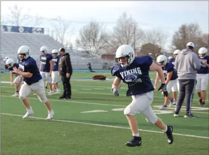  ?? PHOTOS BY SHARON MARTIN — ENTERPRISE-RECORD ?? Players from the Pleasant Valley varsity football team warm up during Friday’s practice at Asgard Yard. It was the first football practice since the COVID-19 pandemic began in March 2020.