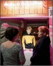  ?? AP/DAVID KEYTON ?? A man in a Star Trek Star Fleet uniform distribute­s tickets to a presentati­on on Klingon Culture at Stockholm’s Turteatern theater.