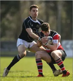  ??  ?? Adam Cullen of Wicklow is tackled by Joe McGowan of Longford.